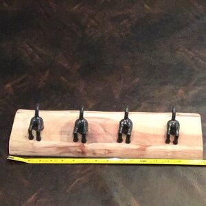 Rustic Wooden Wall Hook Rack with Four Black Iron Dog Tail Hooks
